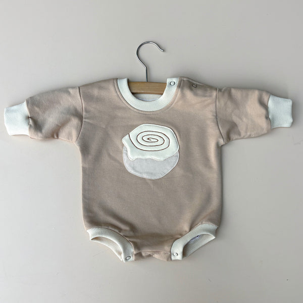 Cinnamon scroll sweater onesie