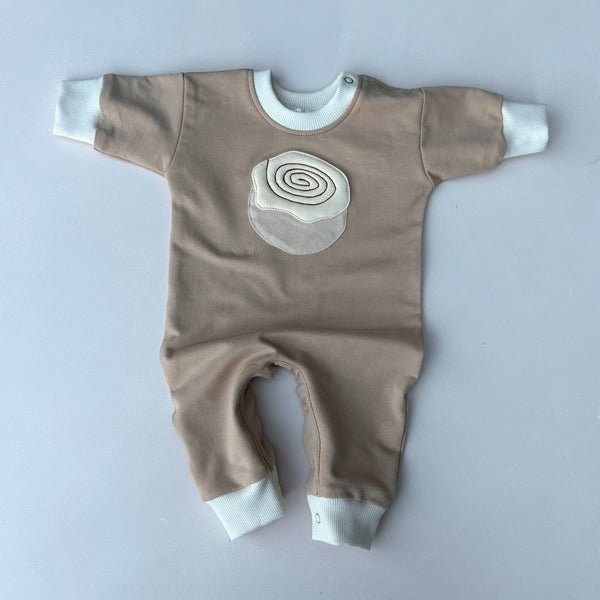 Cinnamon scroll sweater onesie