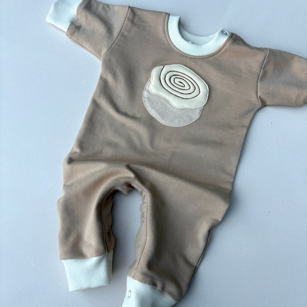 Cinnamon scroll sweater onesie