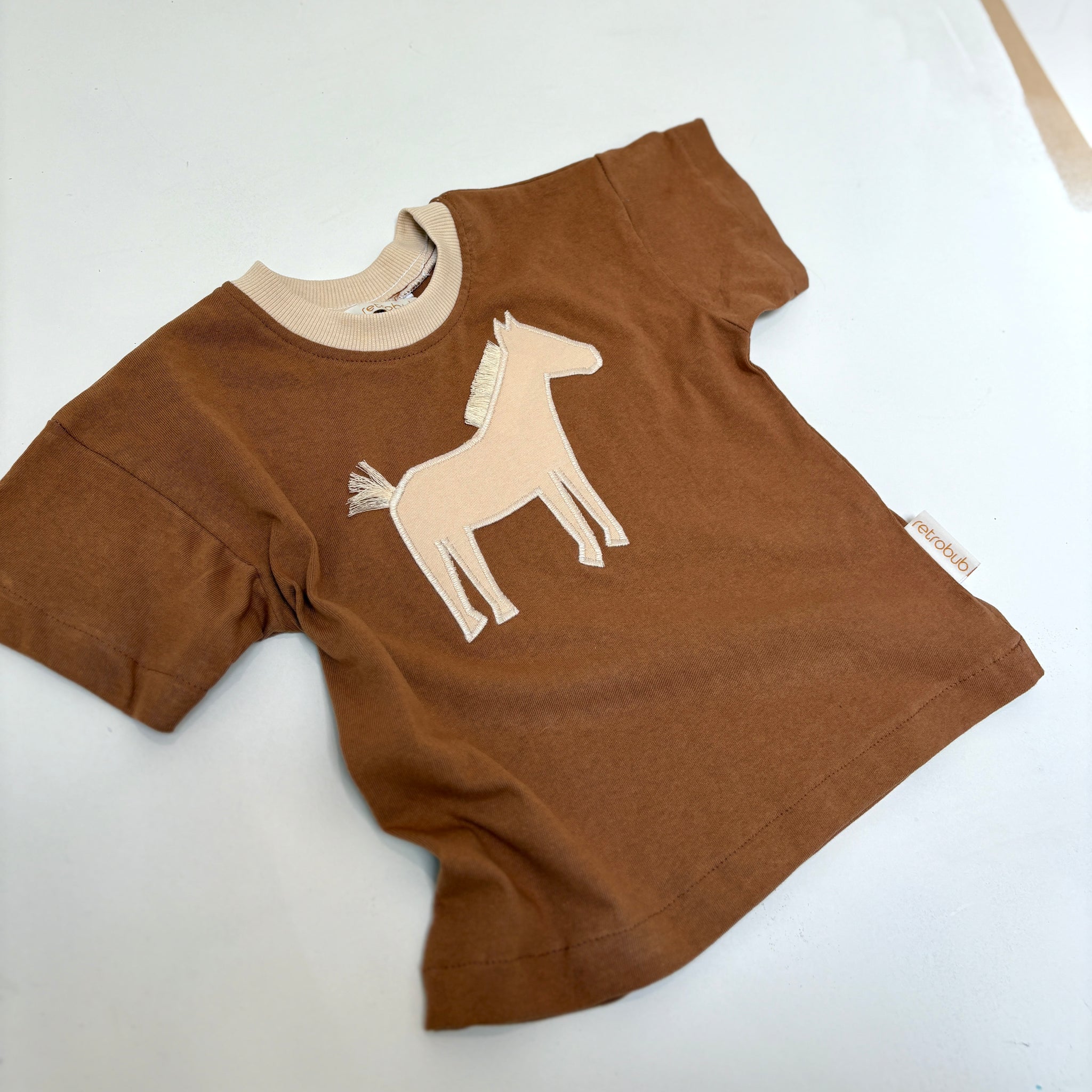 Wild Brumbies tee in toffee- sizes 1-5